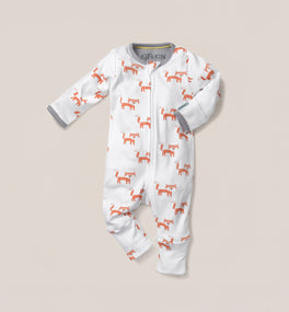 This Kit & Kin fox print baby all-in-one is made from GOTS-certified organic cotton, perfect for keeping newborns comfortable and cosy.